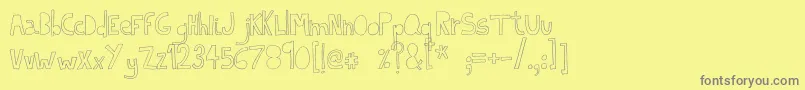 フォントIndietronicaThin – 黄色の背景に灰色の文字