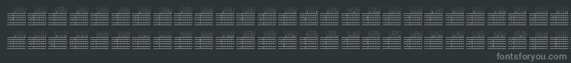 フォントL25q – 黒い背景に灰色の文字