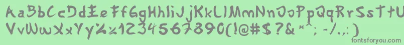 フォントGyosho – 緑の背景に灰色の文字