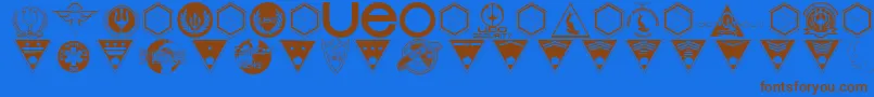 BeneathTheSurfaceDingbats Font – Brown Fonts on Blue Background