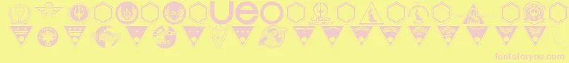 フォントBeneathTheSurfaceDingbats – ピンクのフォント、黄色の背景