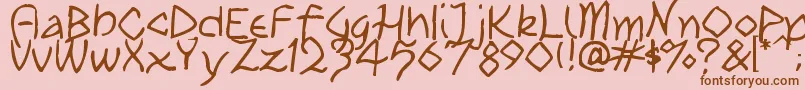 TribalPlay-fontti – ruskeat fontit vaaleanpunaisella taustalla