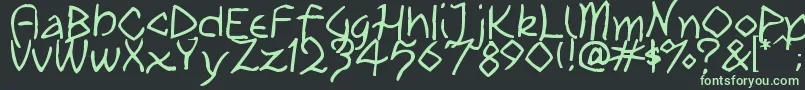 Czcionka TribalPlay – zielone czcionki na czarnym tle