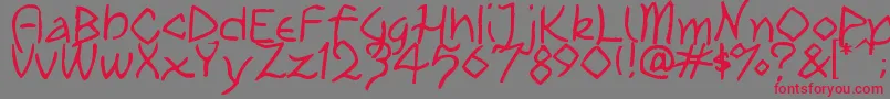 TribalPlay Font – Red Fonts on Gray Background