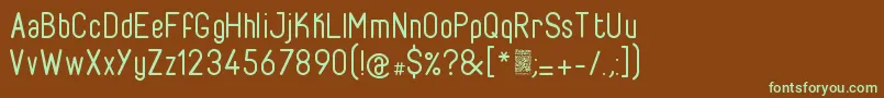 フォントFabioloRegular – 緑色の文字が茶色の背景にあります。