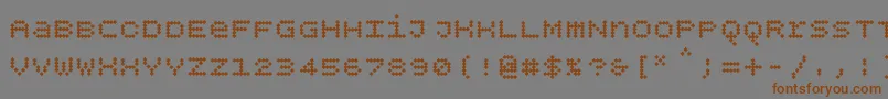 Шрифт Bpdotsunicasediamondbold – коричневые шрифты на сером фоне