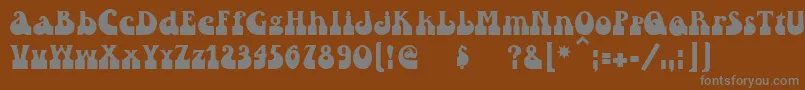 フォントAsylbekm25inkwell.Kz – 茶色の背景に灰色の文字