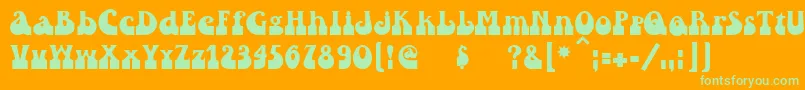 Asylbekm25inkwell.Kz-Schriftart – Grüne Schriften auf orangefarbenem Hintergrund