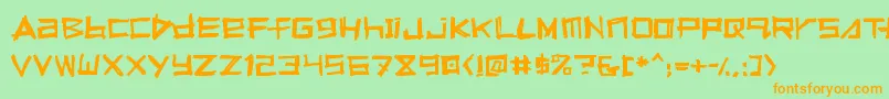 フォントSqueeg – オレンジの文字が緑の背景にあります。
