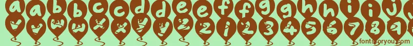 BalloonFloats Font – Brown Fonts on Green Background
