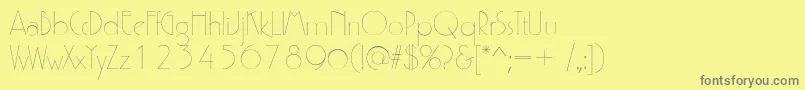 P700DecoRegular Font – Gray Fonts on Yellow Background