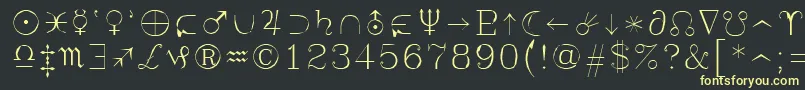 Syastro Font – Yellow Fonts on Black Background