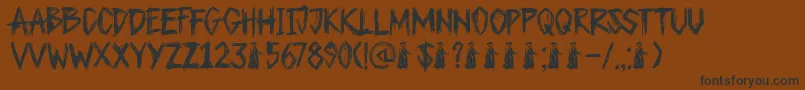 フォントDkPlagueMaster – 黒い文字が茶色の背景にあります