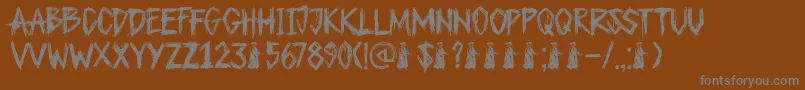 DkPlagueMaster-Schriftart – Graue Schriften auf braunem Hintergrund