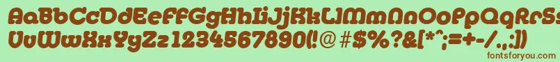 Fonte MexicoserialHeavyItalic – fontes marrons em um fundo verde