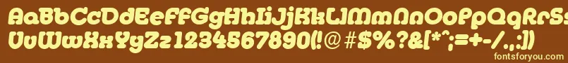 MexicoserialHeavyItalic-fontti – keltaiset fontit ruskealla taustalla