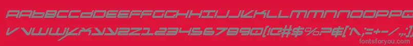 OramacItalicon-fontti – harmaat kirjasimet punaisella taustalla