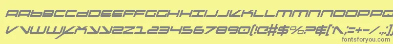 OramacItalicon-fontti – harmaat kirjasimet keltaisella taustalla