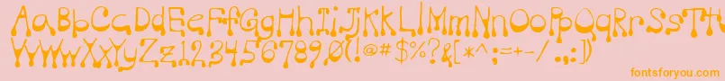 フォントVampire – オレンジの文字がピンクの背景にあります。