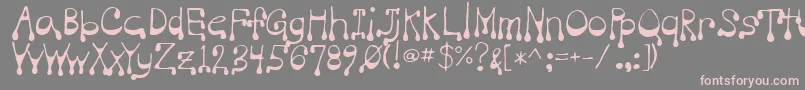 フォントVampire – 灰色の背景にピンクのフォント