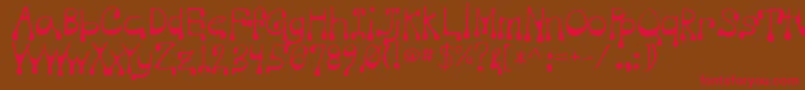 フォントVampire – 赤い文字が茶色の背景にあります。