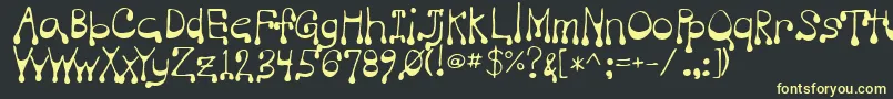 フォントVampire – 黒い背景に黄色の文字