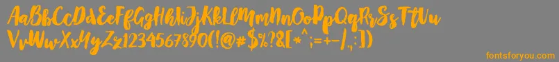 Mayton Font – Orange Fonts on Gray Background