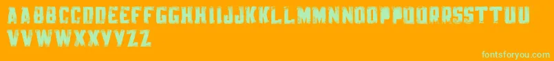 KnackpackStdDistroyDemo Font – Green Fonts on Orange Background