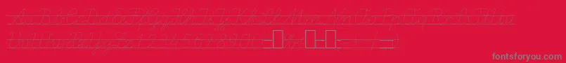 Czcionka LaEl2Italic – szare czcionki na czerwonym tle