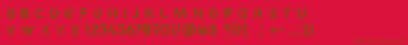 Fonte SdCammelloDemo – fontes marrons em um fundo vermelho