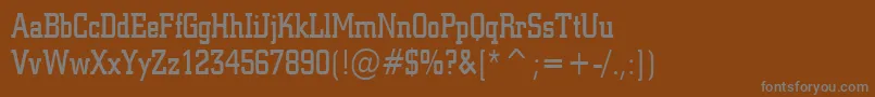 Czcionka Geo957CondensedNormal – szare czcionki na brązowym tle