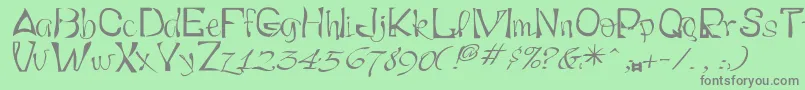 Smartryck Font – Gray Fonts on Green Background