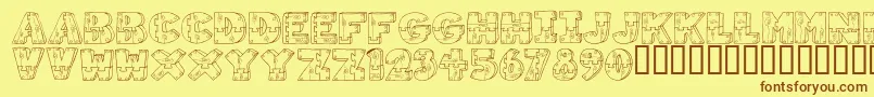 フォントWoodShapes – 茶色の文字が黄色の背景にあります。