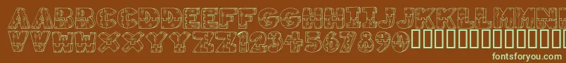 WoodShapes-Schriftart – Grüne Schriften auf braunem Hintergrund