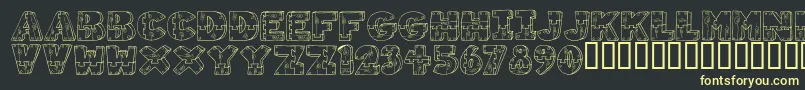 WoodShapes Font – Yellow Fonts on Black Background