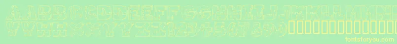 フォントWoodShapes – 黄色の文字が緑の背景にあります