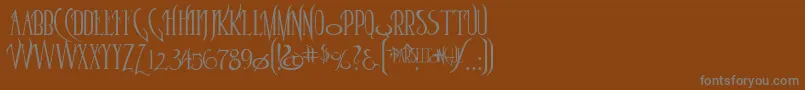 Parseltongue-Schriftart – Graue Schriften auf braunem Hintergrund