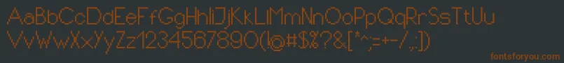 フォントPixIdeal – 黒い背景に茶色のフォント
