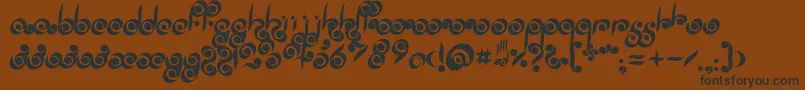 Шрифт Palmofbuddha – чёрные шрифты на коричневом фоне