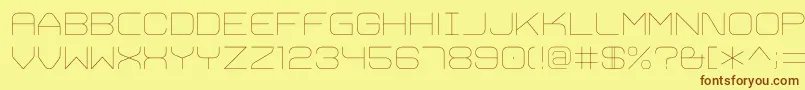 フォントTrivialUltralight – 茶色の文字が黄色の背景にあります。