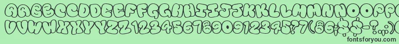 Tourist Font – Black Fonts on Green Background