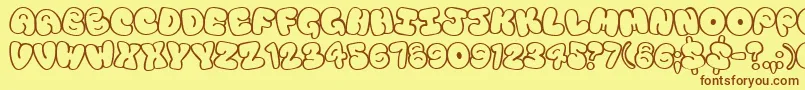 Tourist Font – Brown Fonts on Yellow Background