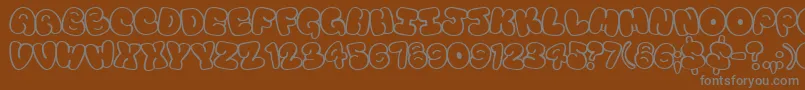 Tourist Font – Gray Fonts on Brown Background