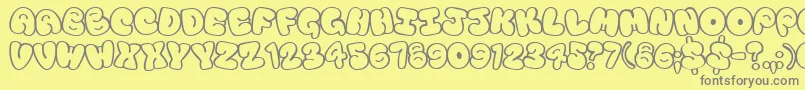 Tourist Font – Gray Fonts on Yellow Background