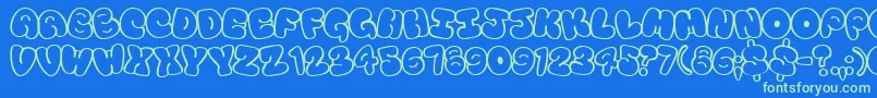 Tourist Font – Green Fonts on Blue Background