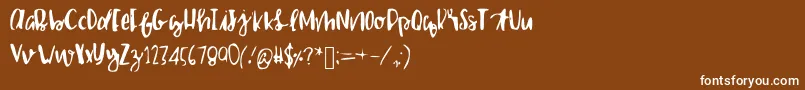 Czcionka Shailettering – białe czcionki na brązowym tle