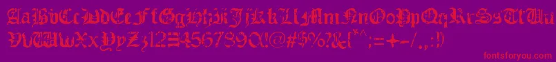 GuerraSanta Font – Red Fonts on Purple Background