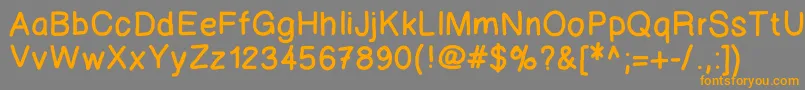 フォント123marker – オレンジの文字は灰色の背景にあります。