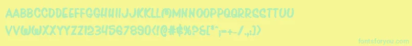 Pressdarlingbold Font – Green Fonts on Yellow Background