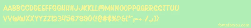 Pressdarlingbold Font – Yellow Fonts on Green Background